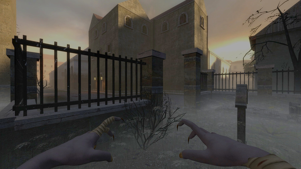 Claws at the foggy cemetery fence